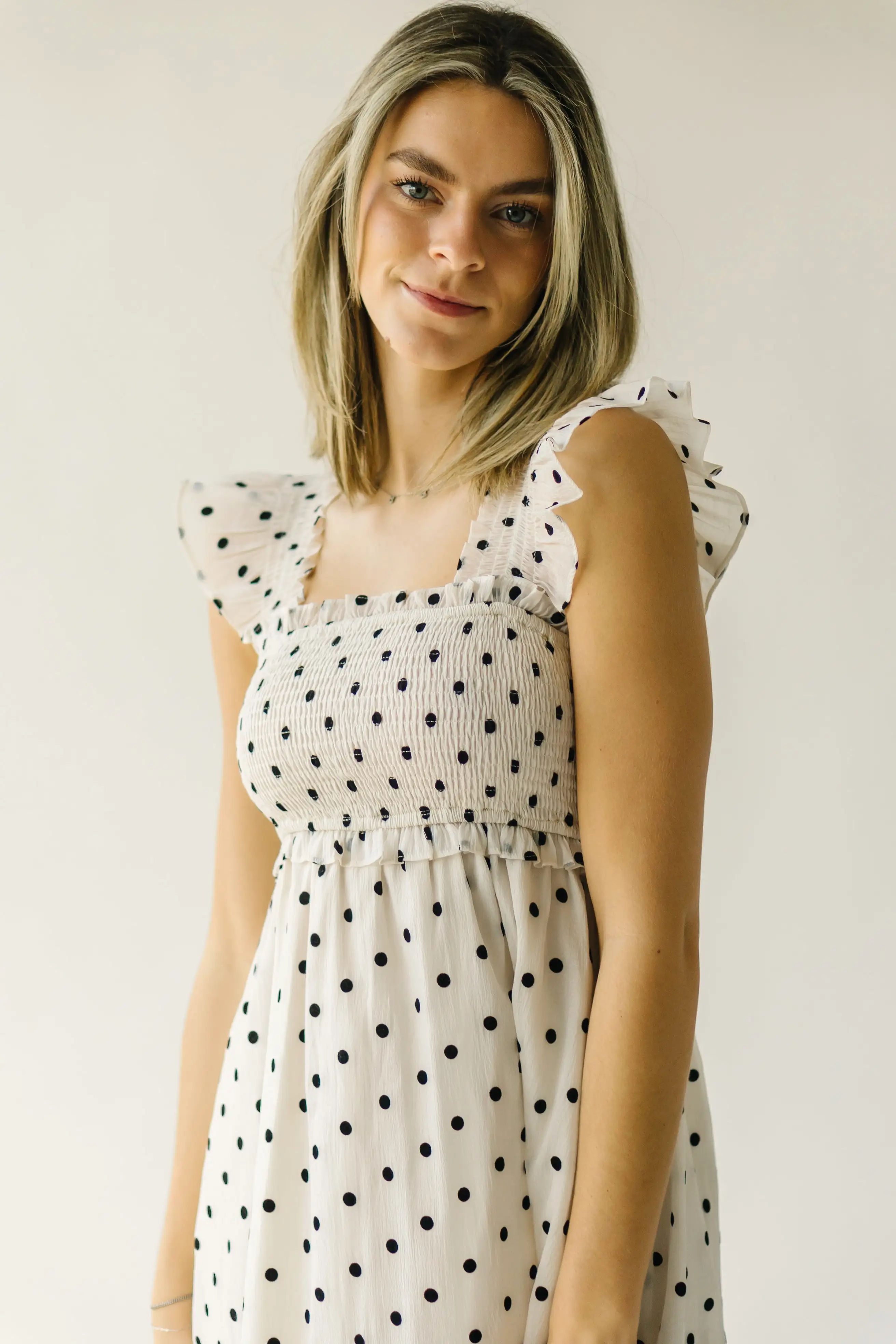 The Ternell Polka Dot Midi Dress in Off White